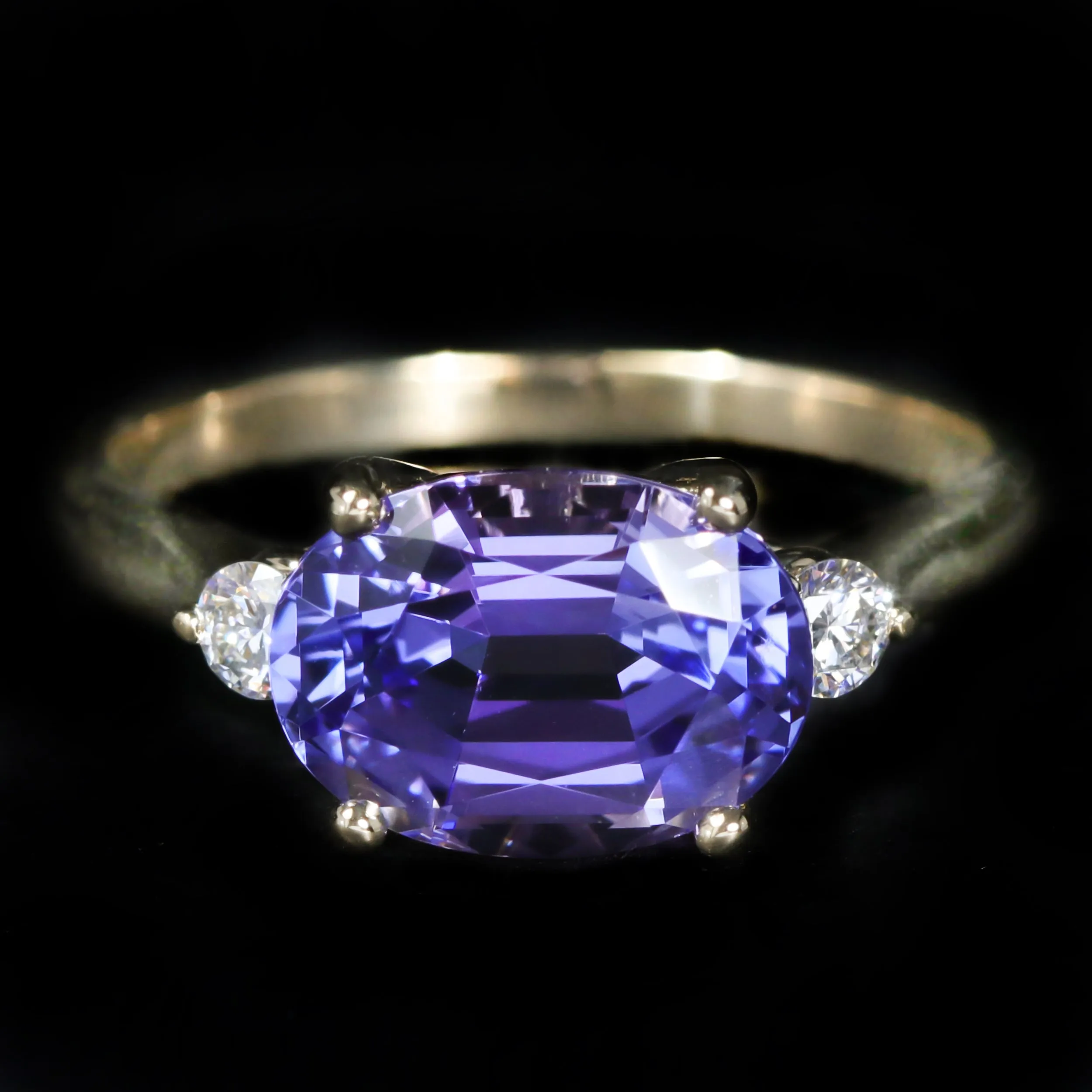 14K Yellow Gold 3.19 Carat Tanzanite and Diamond Ring