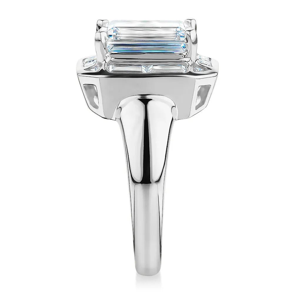 Emerald Cut, Baguette and Round Brilliant halo engagement ring with 4.53 carats* of diamond simulants in 10 carat white gold