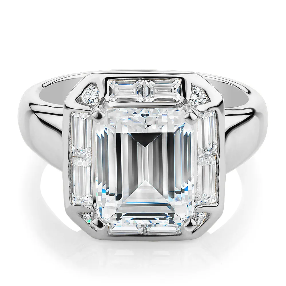 Emerald Cut, Baguette and Round Brilliant halo engagement ring with 4.53 carats* of diamond simulants in 10 carat white gold