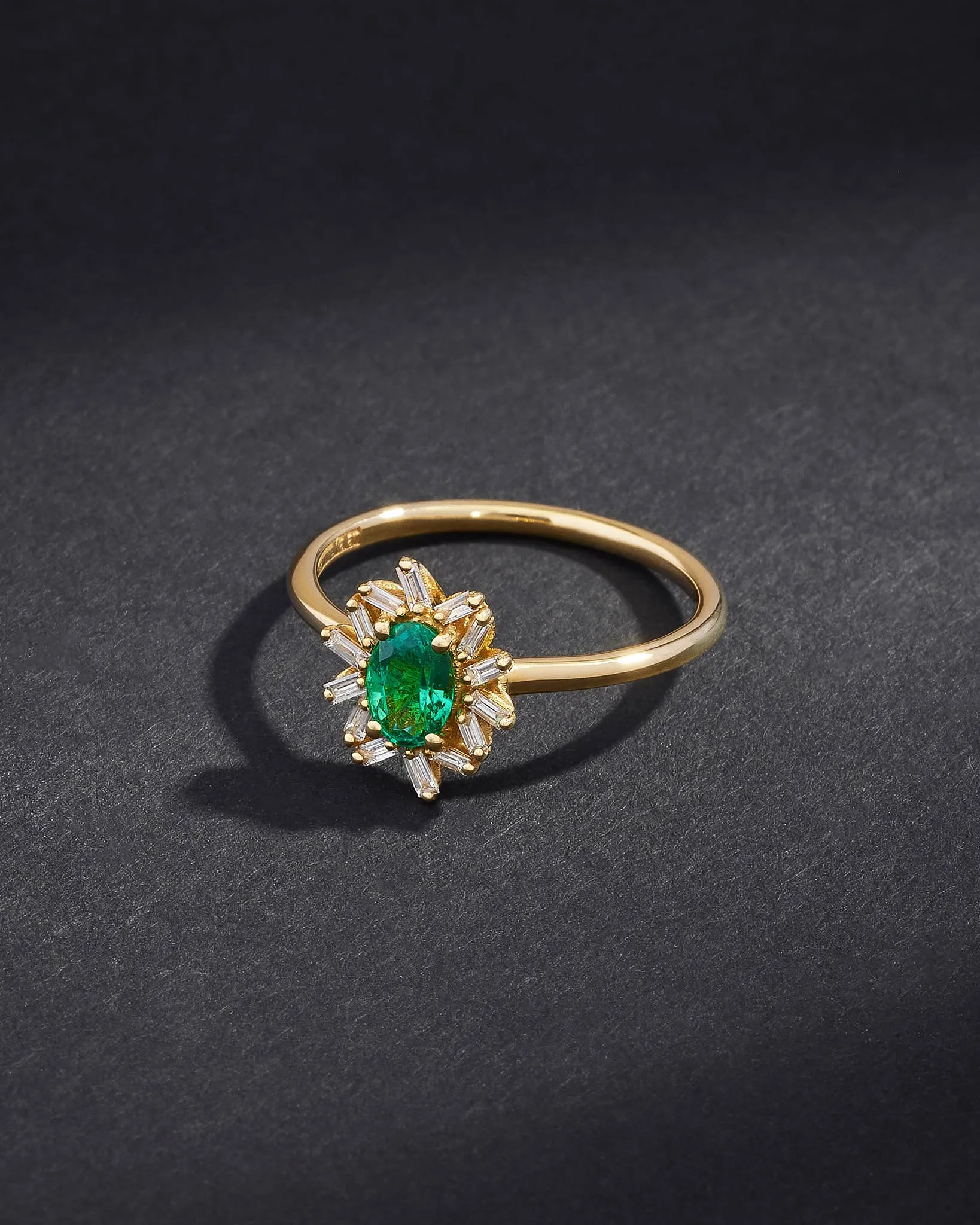 One of a Kind Oval Cut Emerald and Baguette Diamond Ring