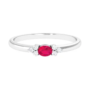 Oval Cut Ruby and Trio Diamond Promise Ring