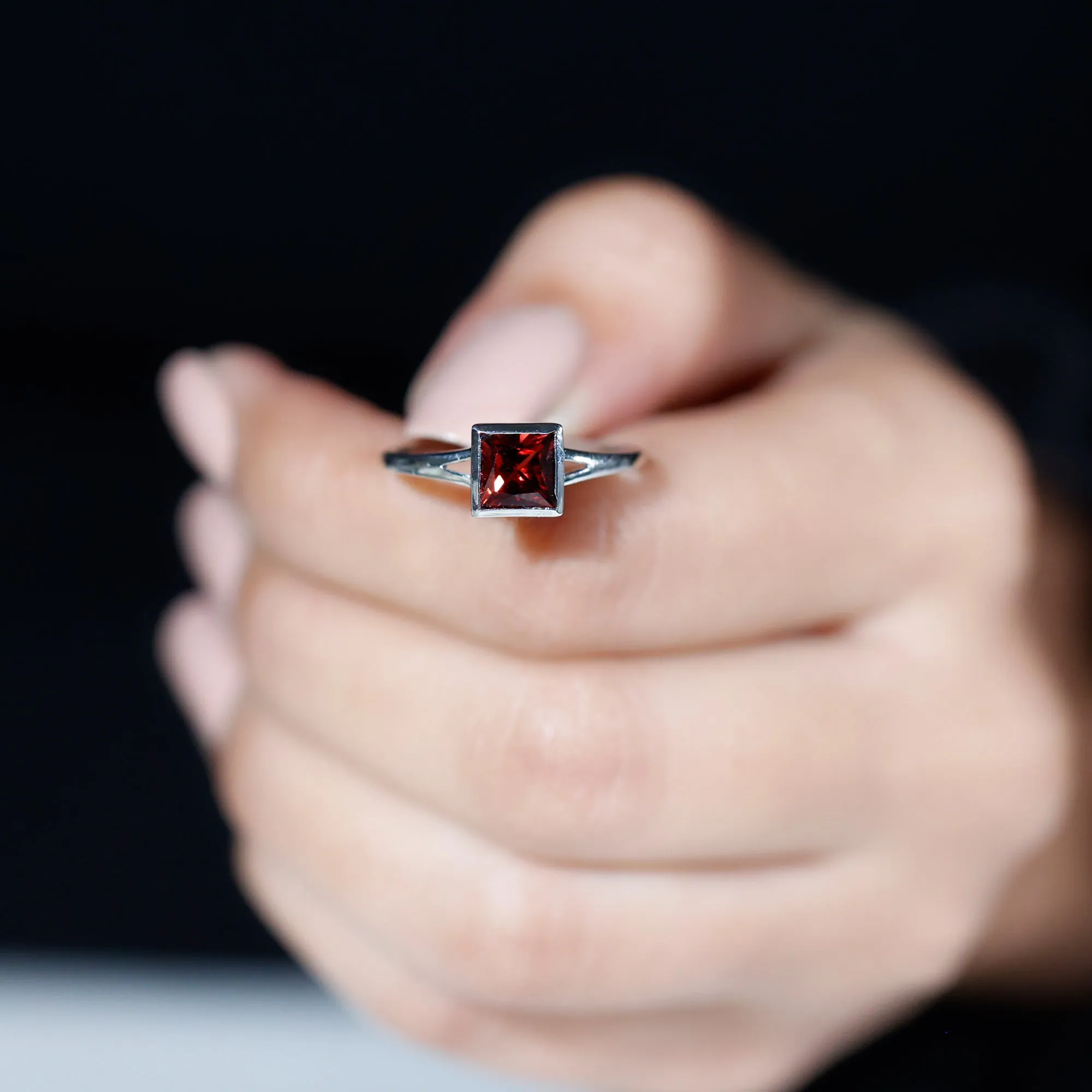 Princess Cut Garnet Solitaire Split Shank Ring in Bezel Setting